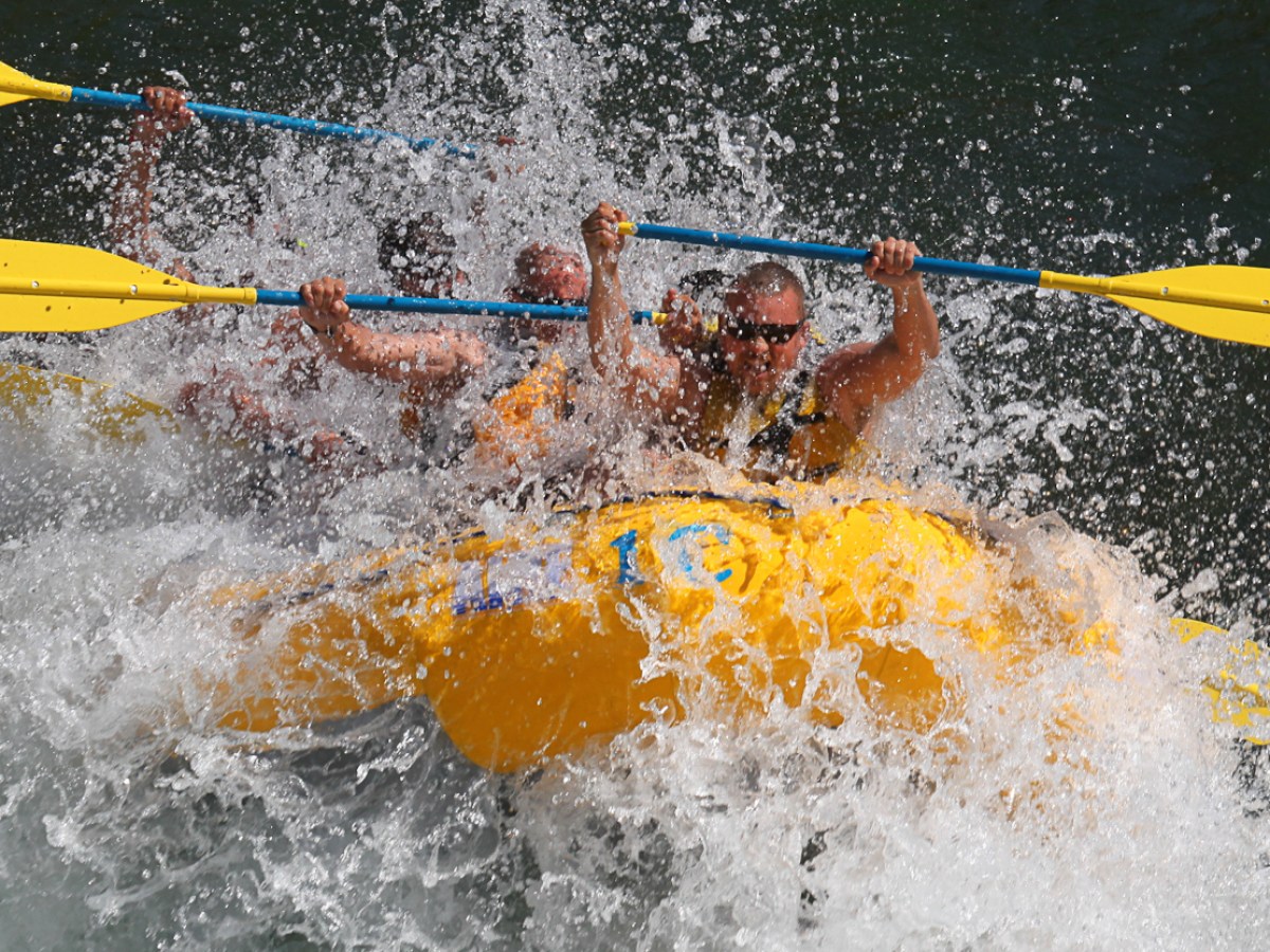 a man riding a surfboard in the water