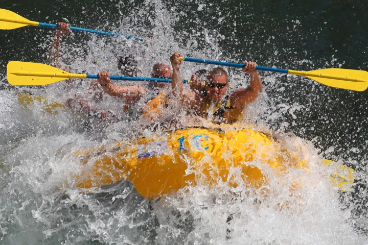 a man riding a surfboard in the water