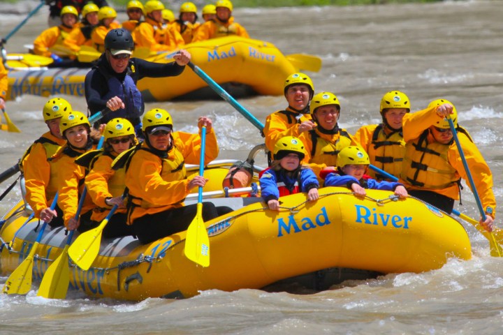 a group of people on a raft