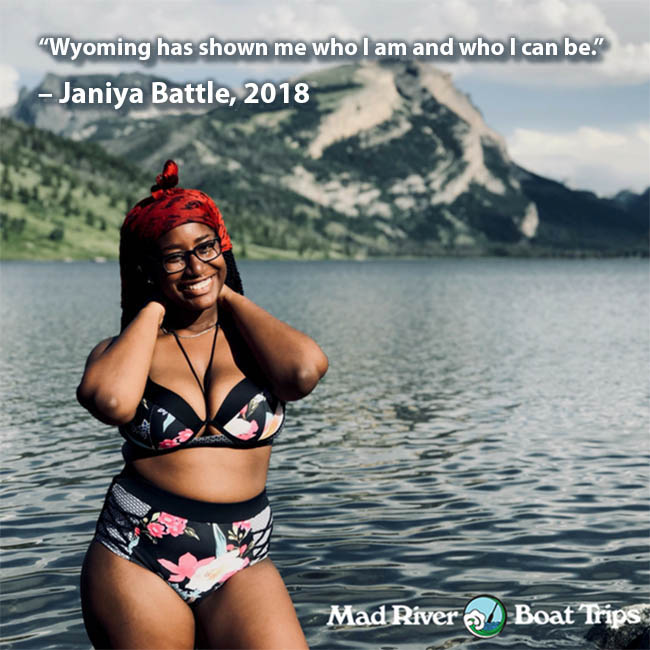 Janiya-battle-not-your-average-internship-Mad-River-Boat-Trips-with-caption a woman standing next to a body of water