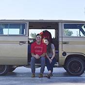 a person standing in front of a truck